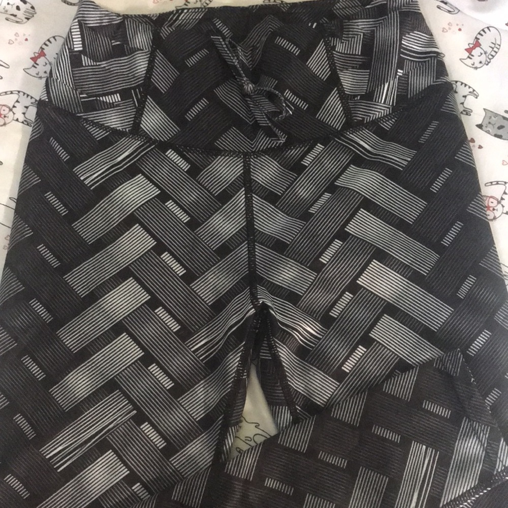 FREE with $10+ purchase Two leggings no tags but never used